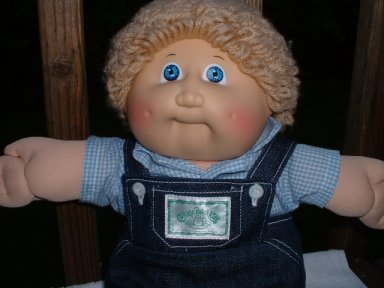 blonde curly haired cabbage patch doll
