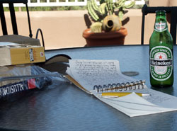 Heineken & the notepad of Dr. Malamud. Note how similar the Starbuck (above left) & Heineken logos are. Click to enlarge