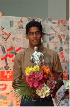 Ali-Shiham with the Maldivian Footballer of the year 2001 trophy