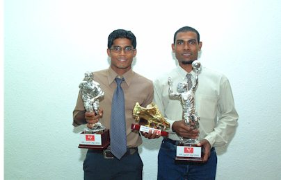 Ali-Shiham-Footballer of the year 2001 and Nizar-Volleyballer of the year 2001 pose for a snap