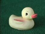 Pale yellow duck with Pacman eyes, eyebrow and airbrushed wing. This one looks angry. He was off of a bath scrubber