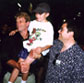 Kevin Conroy (voice of Batman/Bruce Wayne) and Paul Dini with a young fan at the Wizard World Comicon '98; Chicago, IL. [Photo (C) Craig Crumpton]