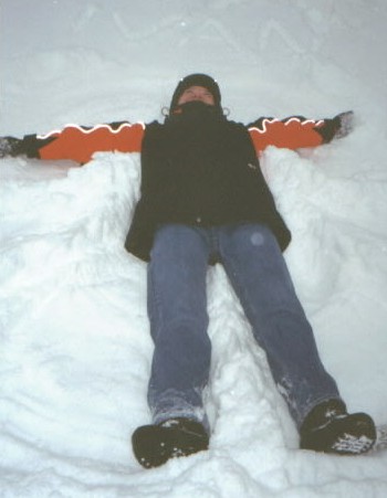May attempts to make a snow angel