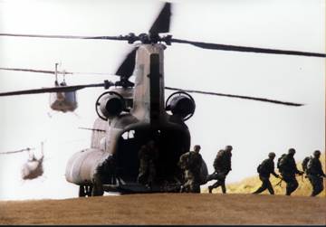 Picture of Marines exiting a helicopter.
