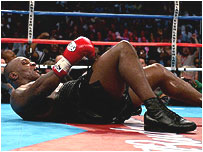 Mike Tyson floored by Lennox Lewis