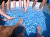 Feet in the paddling pool