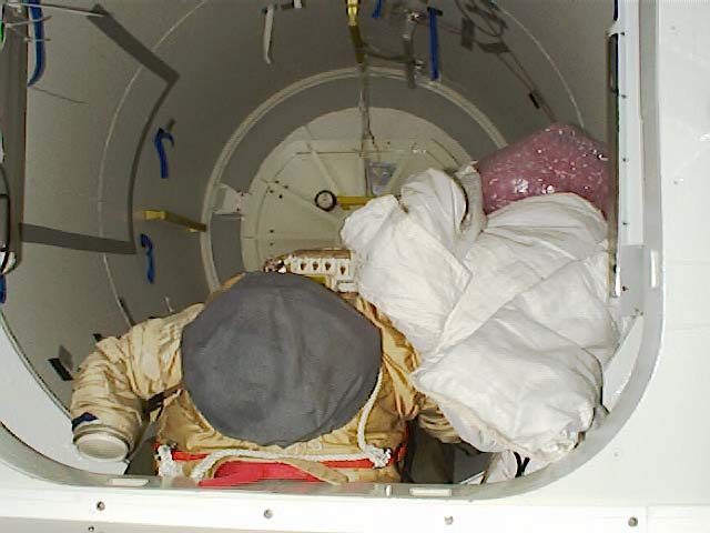 2 suits in Airlock and handrail