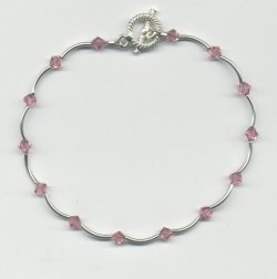 Hand beaded anklet of rose swarovski crystals and silver plated tubes