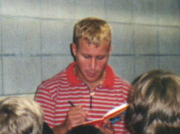 Brent signing autographs for the kids