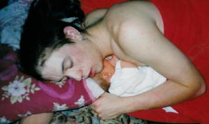 my son sebastian with an exhausted daddy, several hours after his birth on december 2nd 1998.