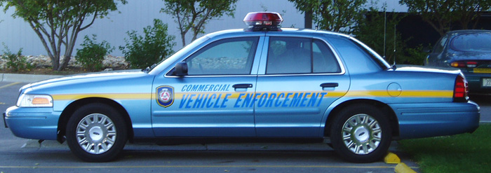 Ford Police Interceptor - bumpers and other body plastic matches the Ford metallic blue color.
