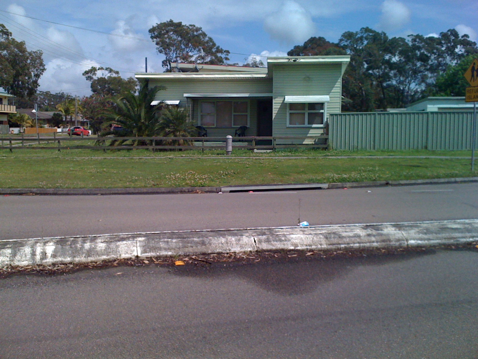 Green Fibro House in Charmhaven, NSW, Australia