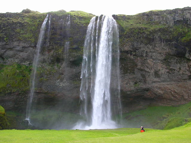 Situated about 150km from Reykjavik, the waterfall at Skogar (Seljalandsfoss) is one of the great attractions of South Iceland. I made my first trip there in June 2006, as part of a tour which also took in the nearby Thorsmork glaciers and forests and wild spaces. As soon as I got on the bus and saw the snow on the mountains and my kind of oldly guide, I realized that I had premonitioned this entire trip in a dream a few months before arriving in Iceland. It was a dream come true, and the scenery wasn't bad either. We passed Hekla, one of the most active volcanoes on Earth. And the sun shone, and the earth was green and fair