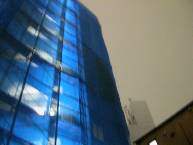 Blue shrouded building near Uguisudani Station Tokyo