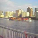 Sumida River with the ferry headed to Odaiba, the new Tokyo shopping and entertainment experience located on an artifical island in Tokyo Bay