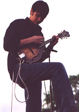 Adam playing mandolin
