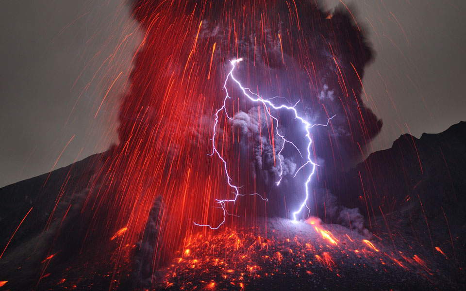  Sakurajima Volcano with Lightning 
Image Credit & Copyright: Martin Rietze (Alien Landscapes on Planet Earth) 
Explanation: Why does a volcanic eruption sometimes create lightning? Pictured above, the Sakurajima volcano in southern Japan was caught erupting in early January. Magma bubbles so hot they glow shoot away as liquid rock bursts through the Earth's surface from below. The above image is particularly notable, however, for the lightning bolts caught near the volcano's summit. Why lightning occurs even in common thunderstorms remains a topic of research, and the cause of volcanic lightning is even less clear. Surely, lightning bolts help quench areas of opposite but separated electric charges. One hypothesis holds that catapulting magma bubbles or volcanic ash are themselves electrically charged, and by their motion create these separated areas. Other volcanic lightning episodes may be facilitated by charge-inducing collisions in volcanic dust. Lightning is usually occurring somewhere on Earth, typically over 40 times each second. 