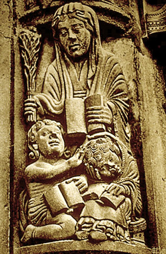Oh, if you're wondering about this little figure, it's from the west door of Chartres Cathedral in France. It depicts "Grammar" one of the Seven Liberal Arts taught in the schools.