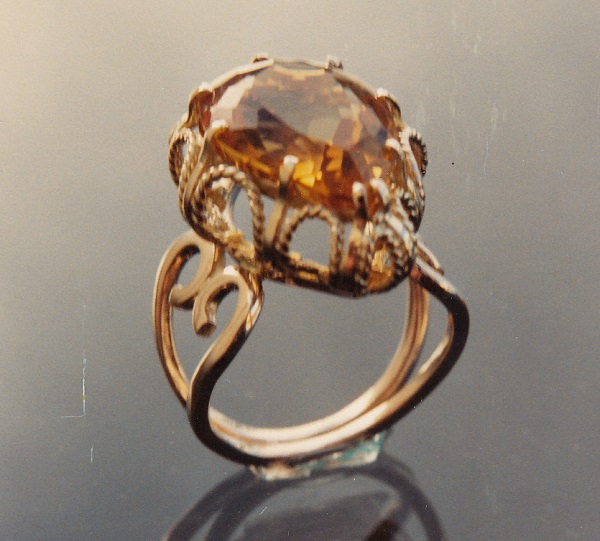 Carefully hand wrought wire ring with large colorful pear-shaped citrine.