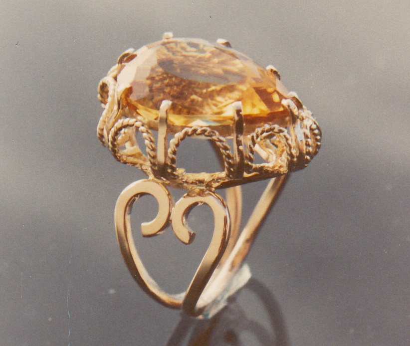 Hand wrought yellow gold wire ring with large pear shaped citrine.