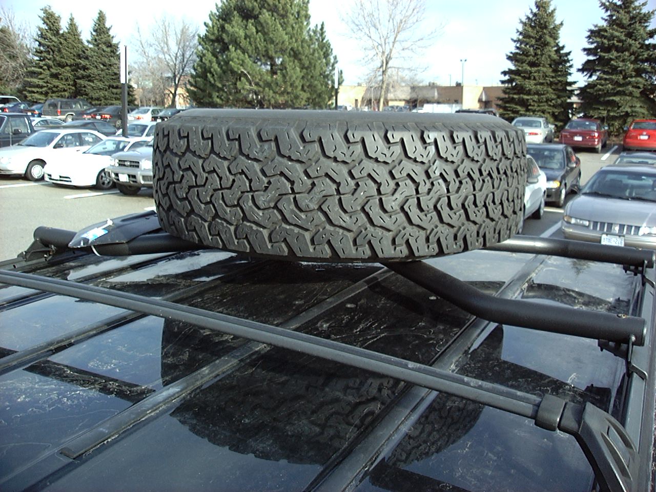 Jeep cherokee rooftop tire carrier