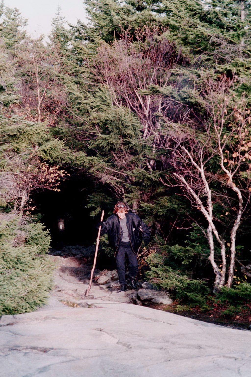 Marie happily ascends the Rollins Trail. 1024x1536