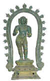 Thirugnana Sambandhar - Bronze in Chennai museum Locality unknown. Height 54 cm. about  11th Century AD. Hair is shown almost like a cap with tuft hanging down behind. Rings are hanging from lobes of ears. There are cymbals in hands. A single plain necklace, sacred thread and short cloth round loins supported by broad plain griddle are present. 