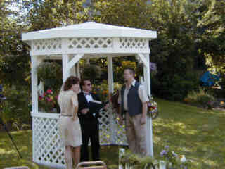 Photo of Rick with photographer and assistant prior to outdoor wedding