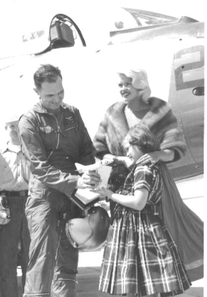 Jayne and Jayne Marie signing an autograph for a Naval pilot at NAS Dallas