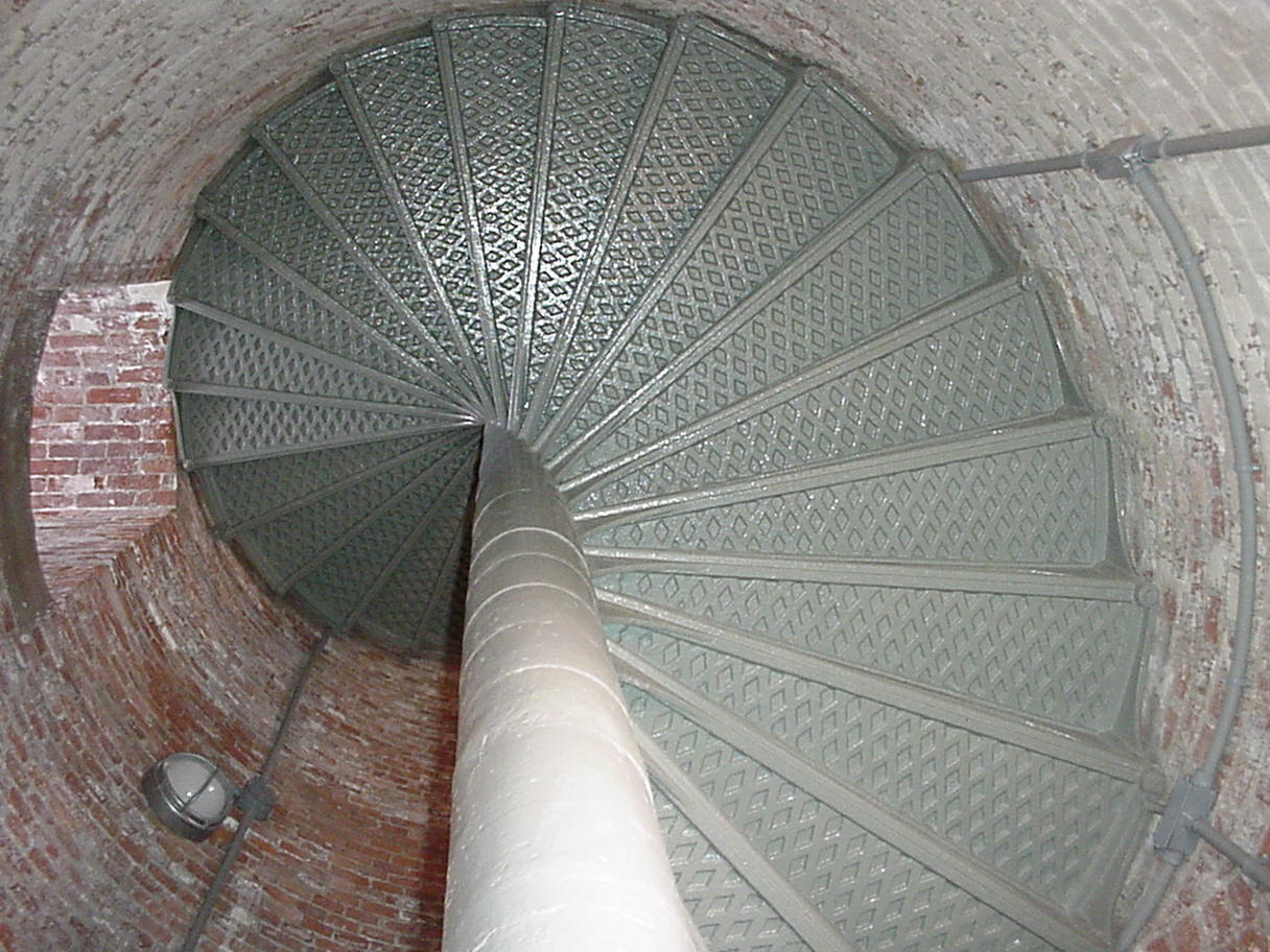Looking up the newly painted spiral staircase towards the top of the light.