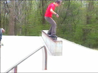 Eliot doing a 5050 run down the sloped ledge then across another ledge.