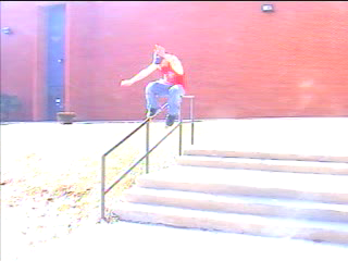 Joe sticking a makio on Hilliard Memorial Middle School's handrail.