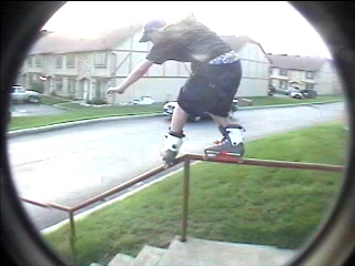 Joe doing a soul over a triple kinked handrail in Columbus, Ohio.