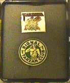 Signal Oil Tarzan Club and Tarzana Pins on Case