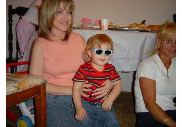 Grandma, Elijah looking cool with his shades & Aunt Val