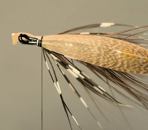 Repeat the process of tying in the wing on the opposite side of the fly.