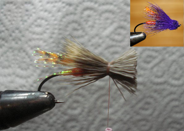 Change to Kevlar thread. Place clump of stacked deer hair at 3/4 shank. Pull and spin to slightly flair.