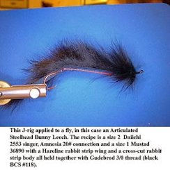 This J-rig applied to a fly, in this case an Articulated Steelhead Bunny Leech. The recipe is a size 2  Daiichi 2553 singer, Amnesia 20# connection and a size 1 Mustad 36890 with a Hareline rabbit strip wing and a cross-cut rabbit strip body all held together with Gudebrod 3/0 thread (black, BCS #118).