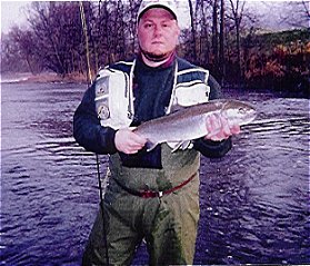 Brian Ebert on the Sheboygan River with a fly caught steelhead