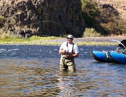 Albuquerque, New Mexico fly fisherman Don Sanchez is into a summer-run steelhead during his 2003 trip to the Grande Rhonde in Washington.