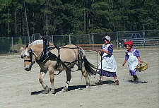 Farm girls with plow horse