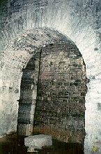 An interior arch connection the middle portal with the side portal