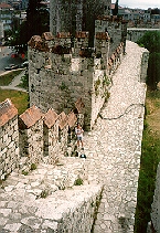 Inside the Yedikule, looking down from the north western tower, to Denise on the wall walk.
