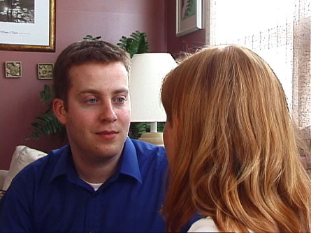 Scott Harris (Paul) tells Megan Earle (Michelle) all about his trip to Europe.