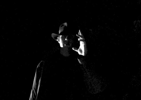 [THE KILLER ready to strike.]