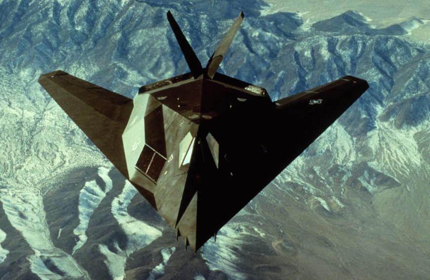 Stealth Fighter over mountains