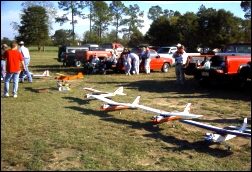 R/C planes lined up ready to fly.