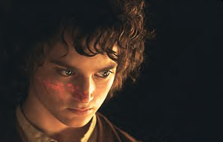 Elijah as Frodo, with the words on the One Ring reflecting on his ABSOLUTLY BEAUTIFUL FACE. What did I tell you?? GORGEOUS!!!!! ::glomps Elijah::
