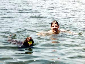 Soji swims with dad