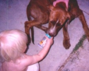 Maddie feeding Lucy Baba